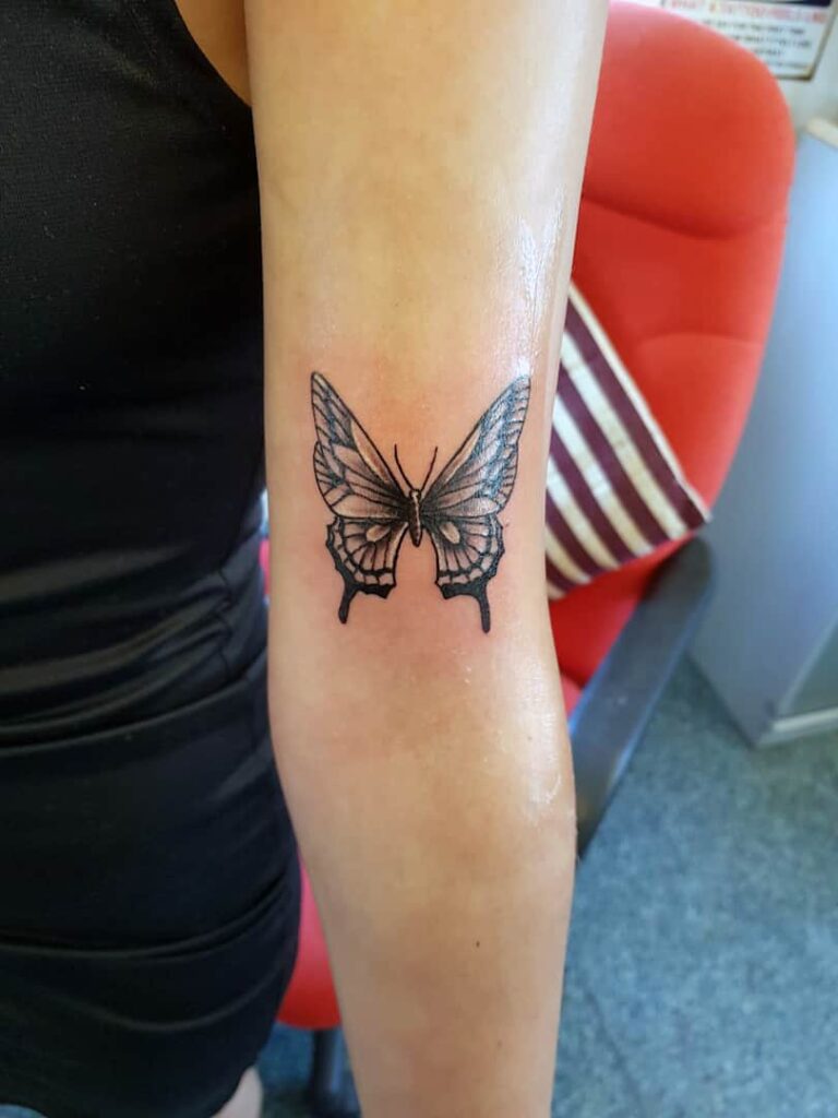 Butterfly tattoo. upper arm. John at Rogsy Tattoo Studio.