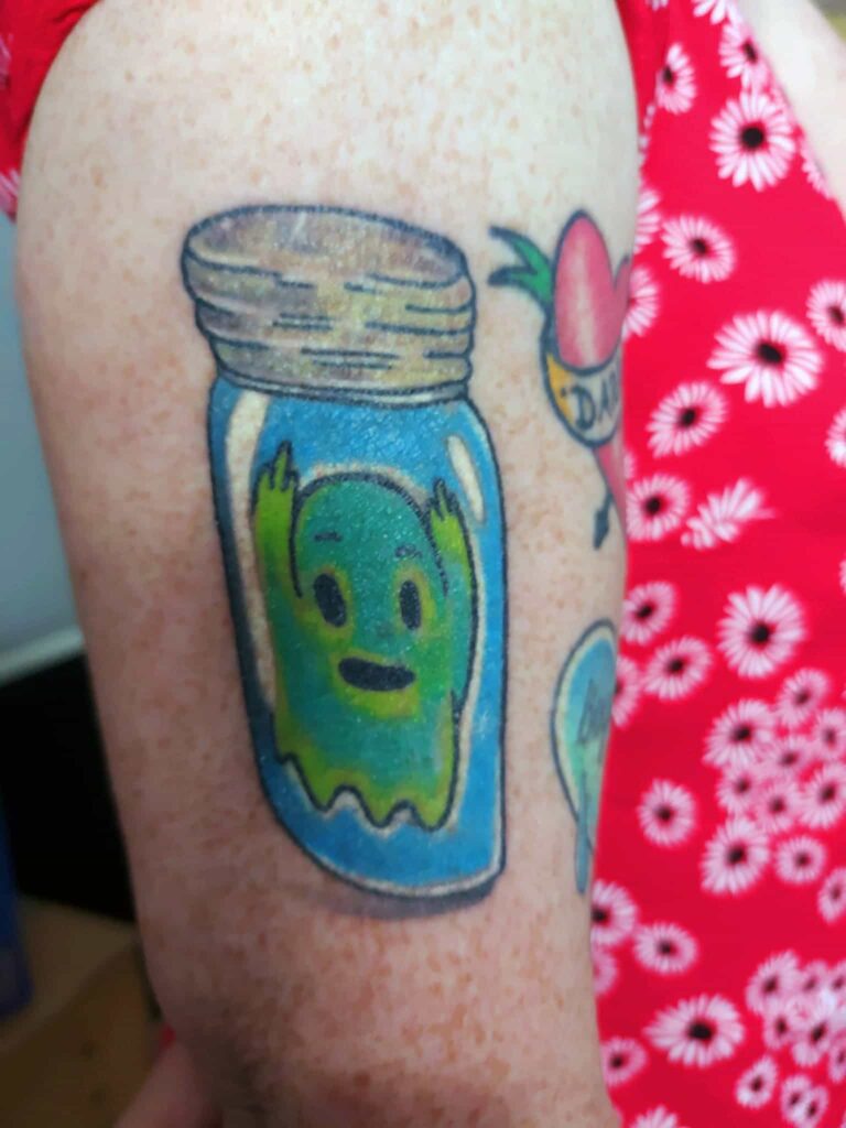 Ghost in a jar tattoo. John at Rogsy Tattoo Studio.